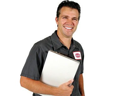 Service man holding clipboard